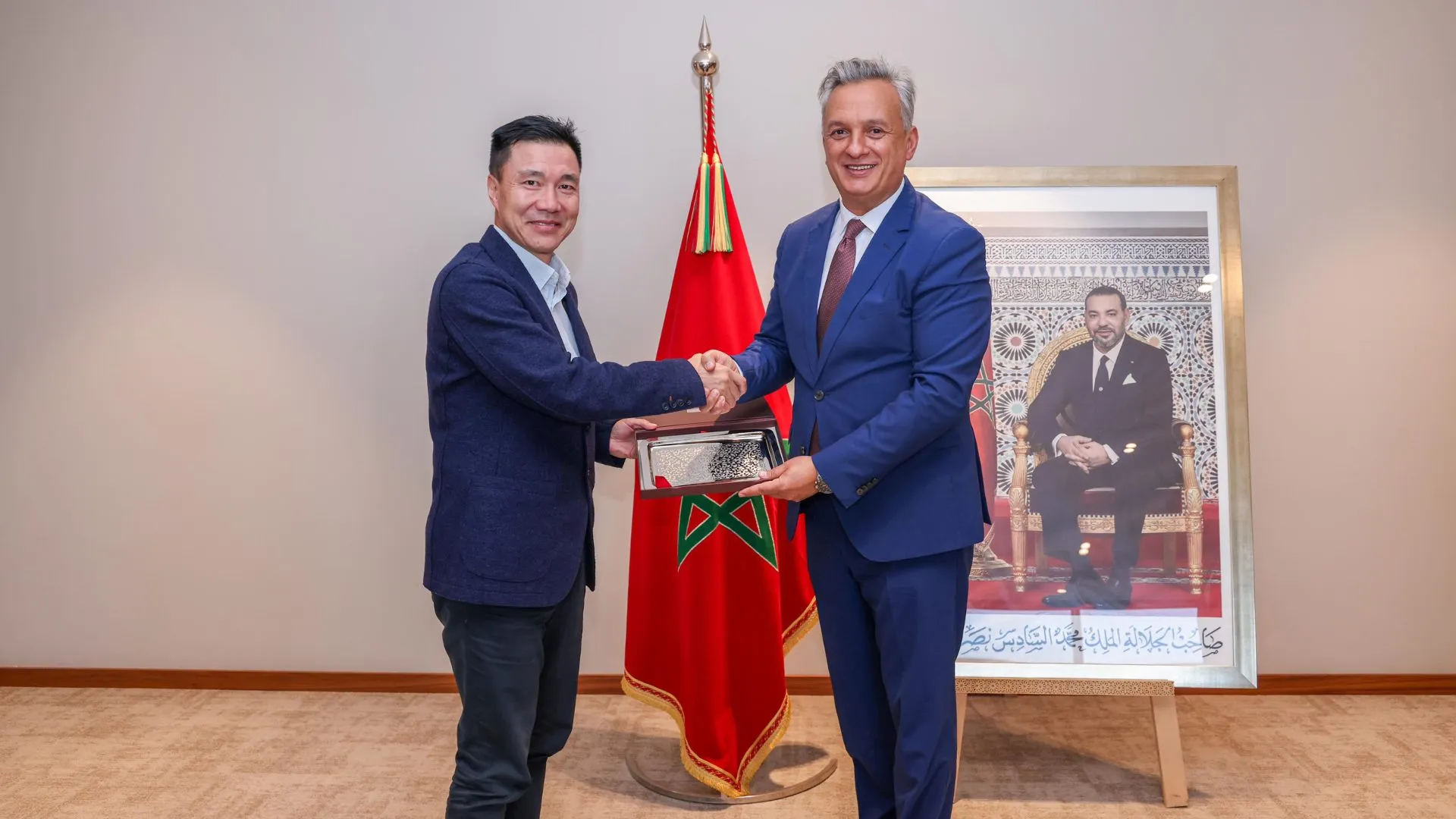 Yang Shuzhan of BTR New Material Group with Moroccan Investment Minister Karim Zidane